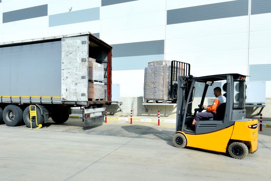 forklift loading a truck